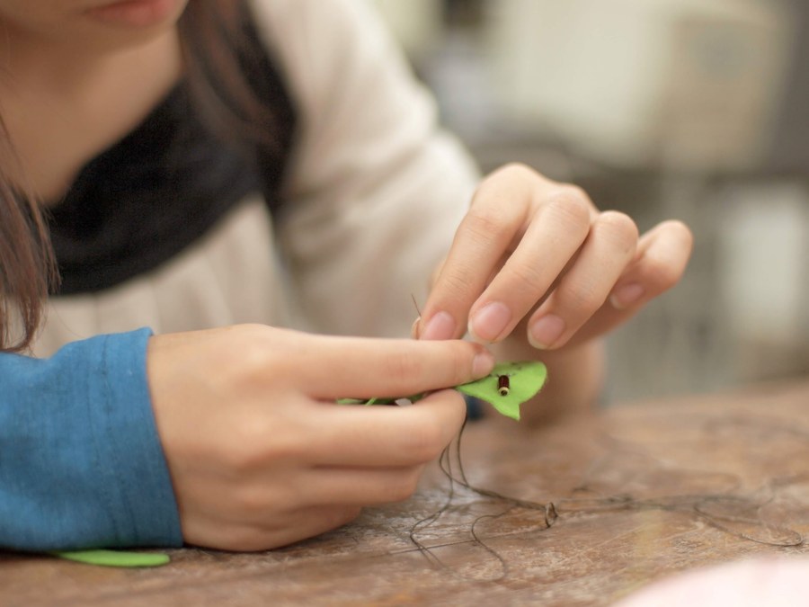Sewing the resistor's leads