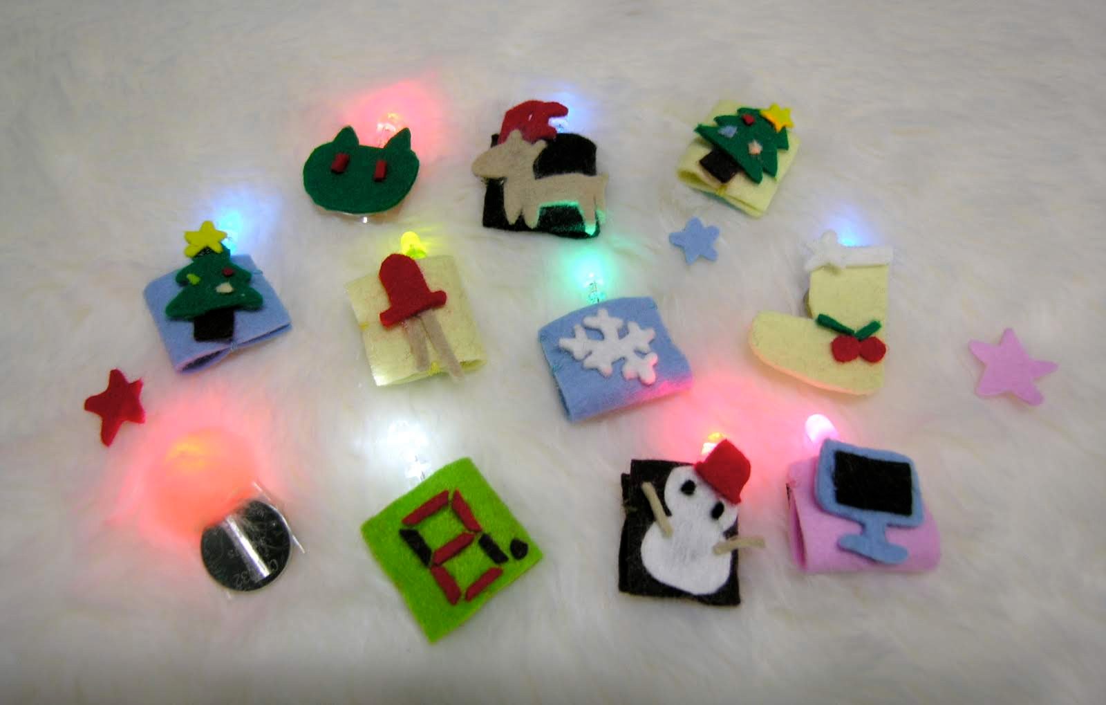 LEDとフェルトで作ったクリスマスモチーフのブローチたち
